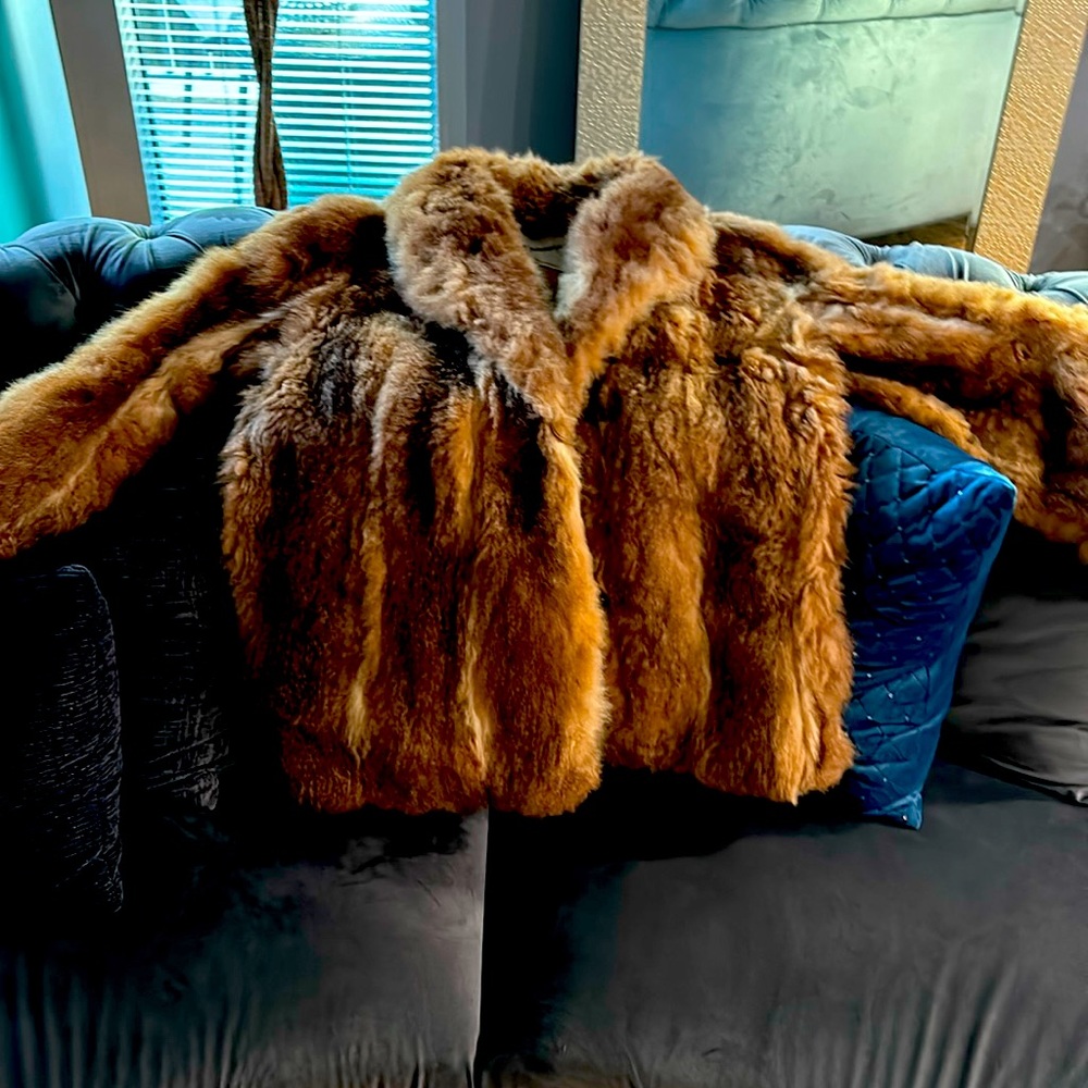 This is a original, John Gimourginas 1980 Vintage Red Glory 28” long 3/4coat